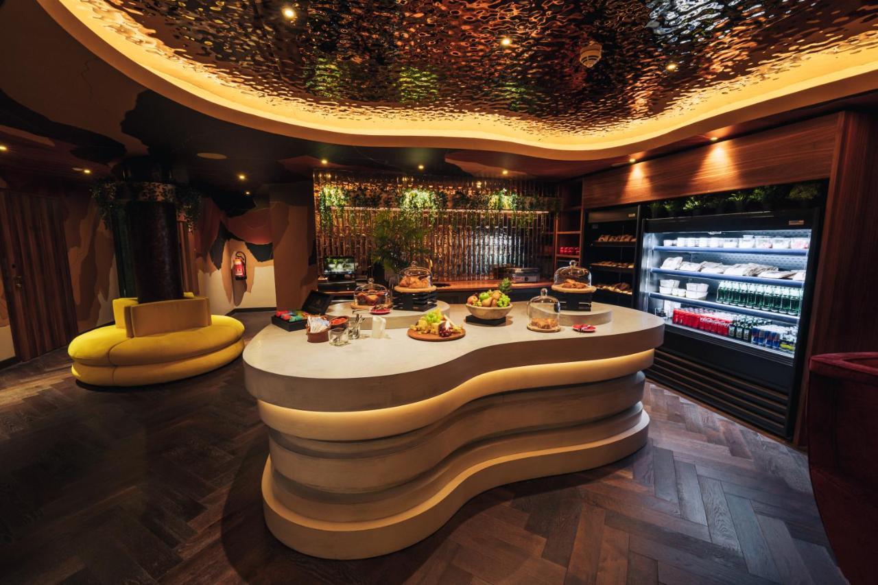 Five Zurich - Luxury City Resort ภายนอก รูปภาพ The interior of the restaurant